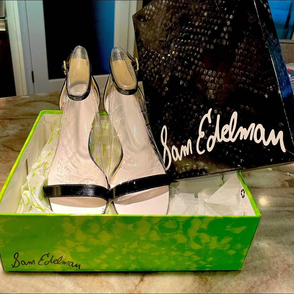 Black patent size 81/2 wide Sam Edelman heels.
